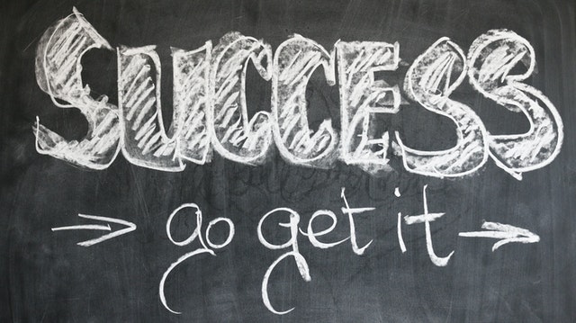 “Success, go get it” written on a blackboard